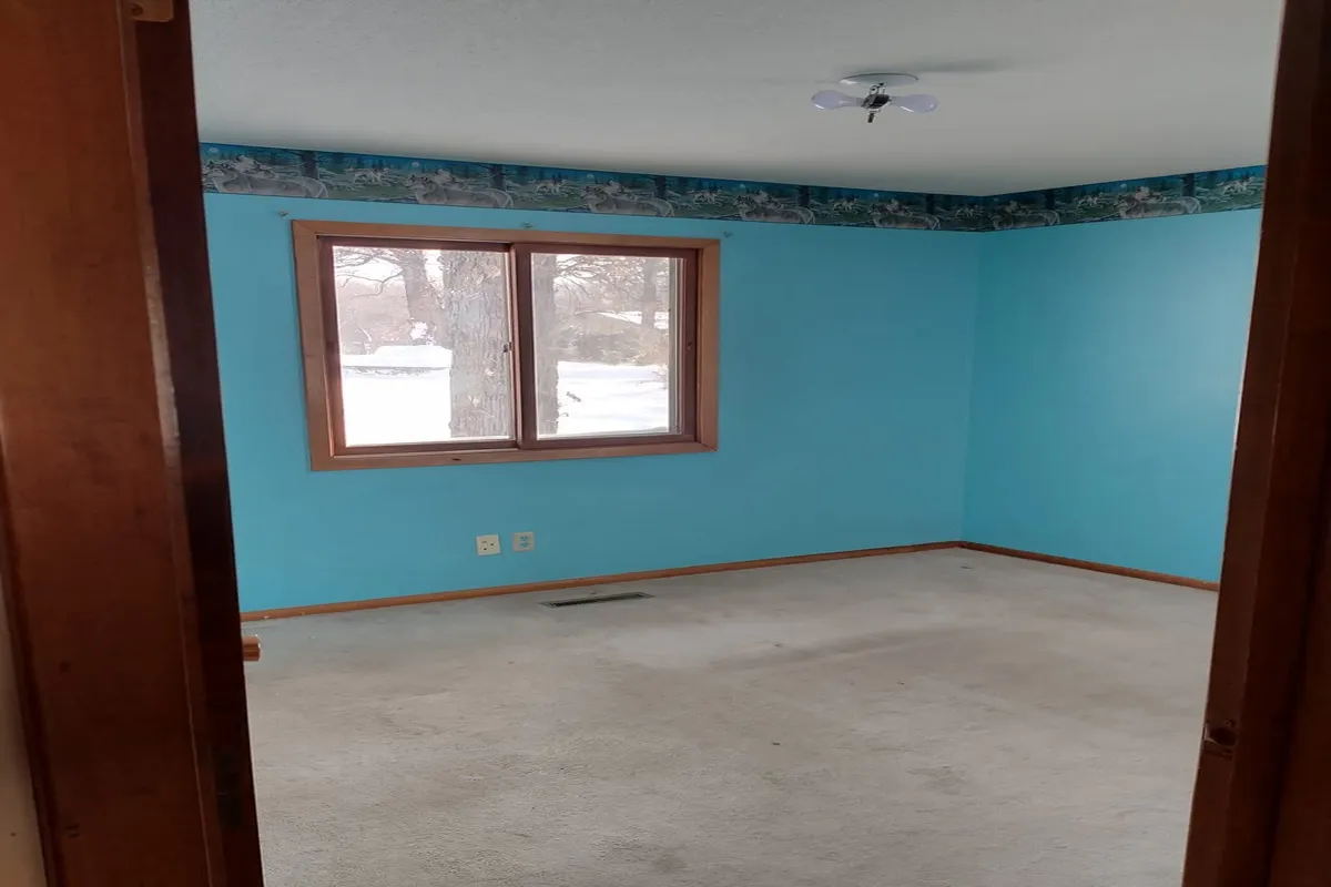 Interior room with blue walls painted in St. Paul MN