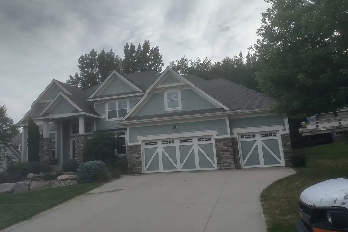 Home exterior painted light green